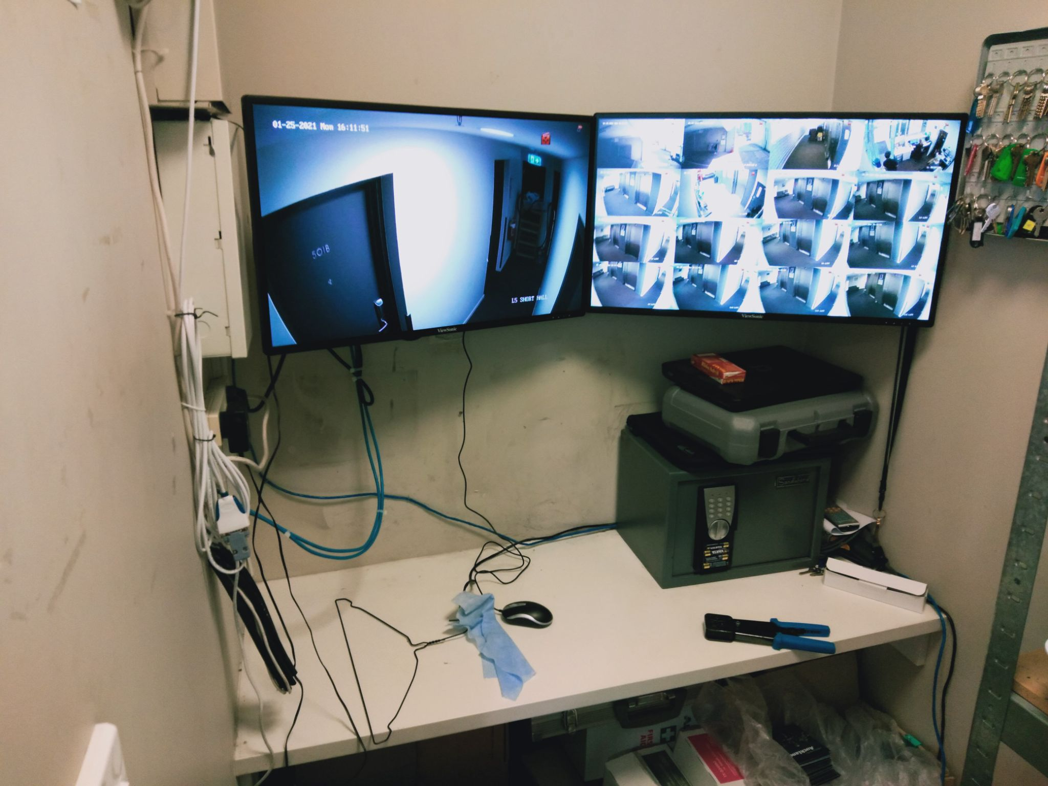 CCTV monitoring station with dual ViewSonic monitors and 16-cam grid